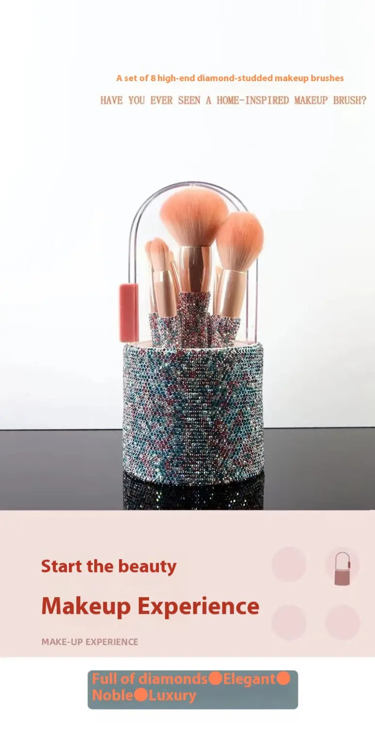 A high-end diamond-studded makeup brush set with eight rose gold handled brushes and soft peach bristles in a clear glittering rhinestone storage case.