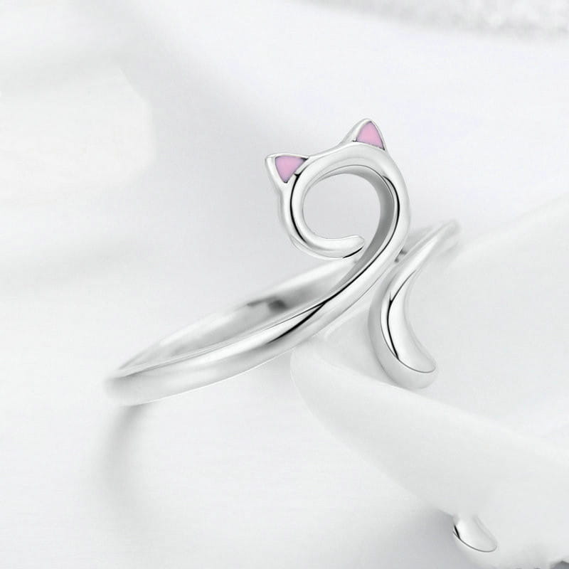 A delicate 925 sterling silver cat ring with pink enamel accents on the ears.