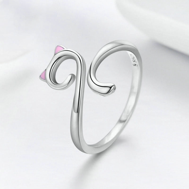 A delicate 925 sterling silver cat ring with pink enamel ears.