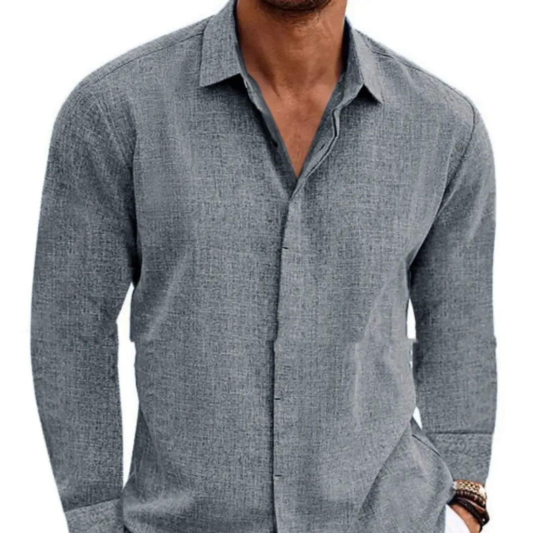 A men’s retro cotton linen blend long sleeve button up shirt in textured gray fabric with a classic collar and subtle stitching details.