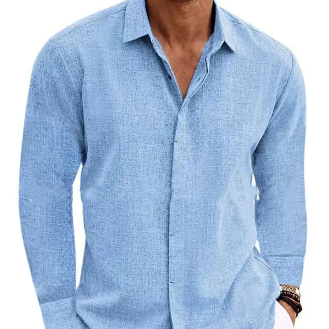 Light blue textured men’s retro long sleeve button up shirt made from a cotton linen blend.