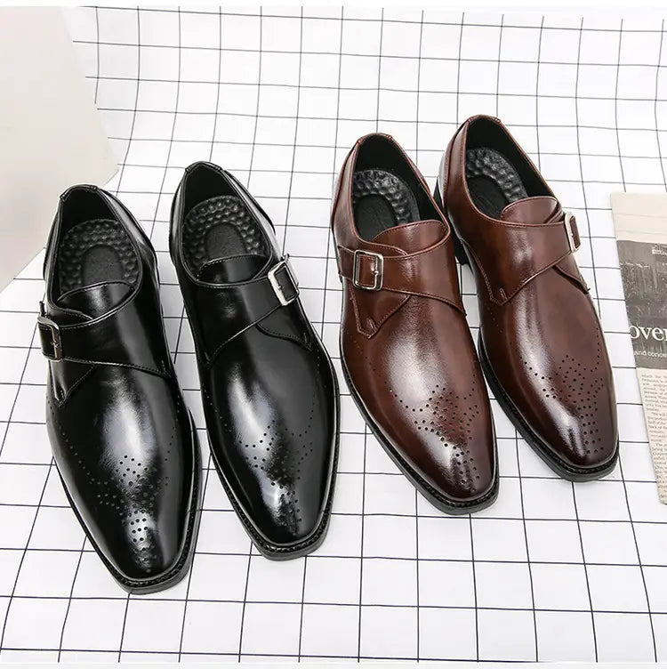 Black leather monk strap dress shoe with polished finish and perforated detailing for men.