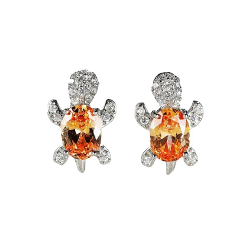 Zarte Schildkröten-Ohrsteckerschmuckstücke mit einem leuchtend orangefarbenen Edelstein-Korpus und funkelnden Diamant-Akzenten an den Schalenflossen und dem Kopf aus dem bunten Kristall-Schildkröten-Ohrsteckerset.