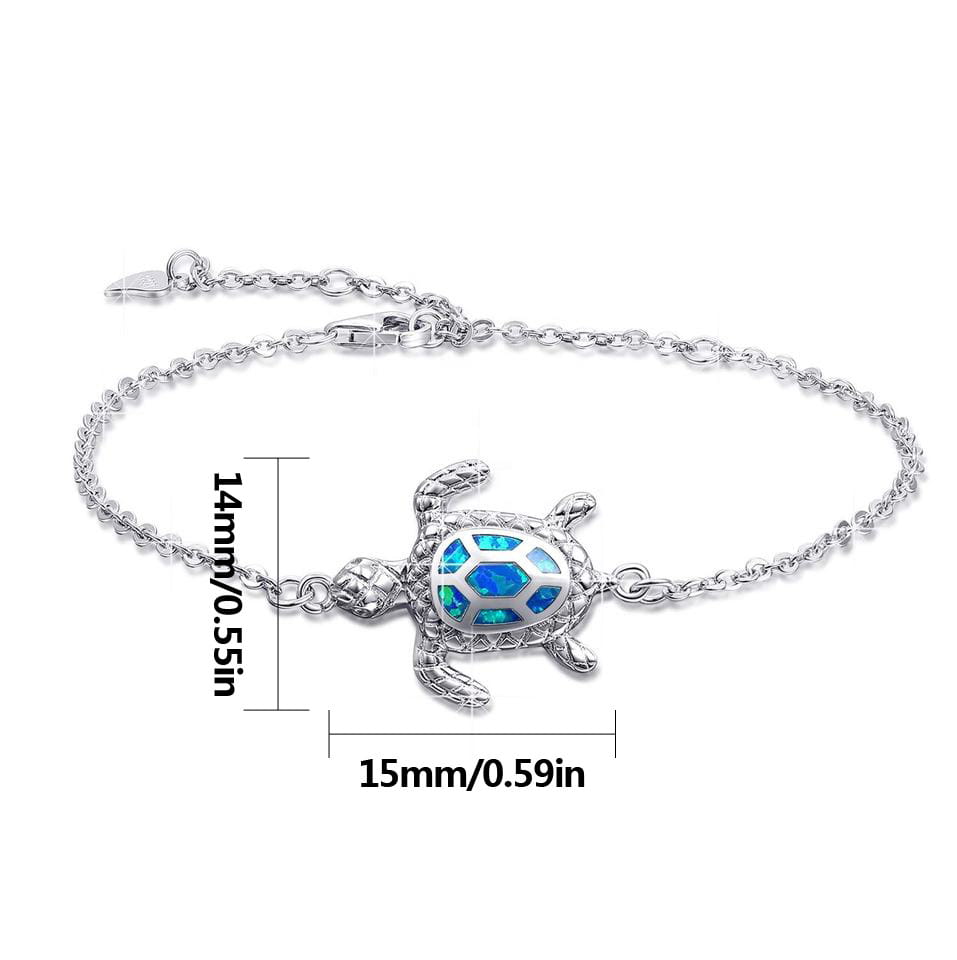 Silver sea turtle anklet featuring a delicate chain and a blue opal inlay in a silver turtle shape.