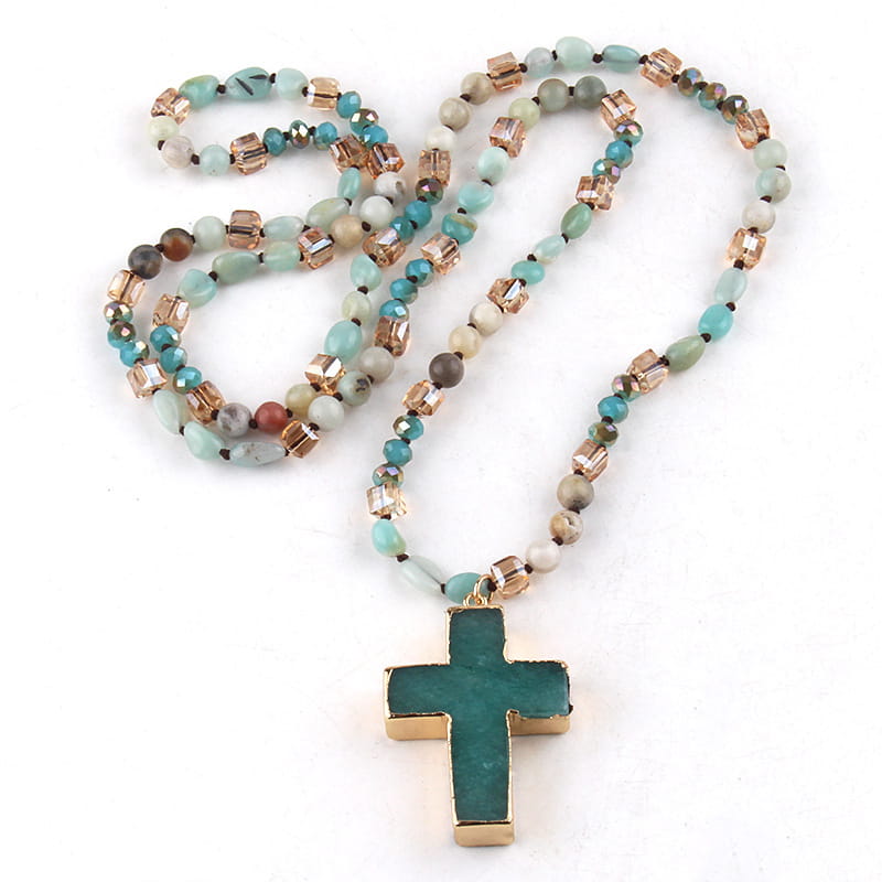 Bohemian natural stone and glass beaded cross necklace featuring a teal and gold pendant with turquoise matte green and rose gold beads.