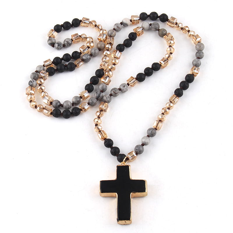 Bohemian natural stone and glass beaded cross necklace featuring matte black, gray marbled, and faceted gold-toned beads.