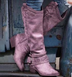 women’s suede knight boots in pink featuring decorative stitching and a buckle strap detail