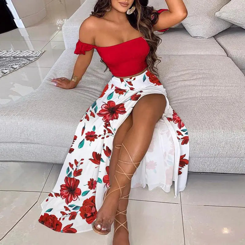 Bohemian off-shoulder two-piece maxi dress featuring a red and white floral maxi skirt with a high slit.