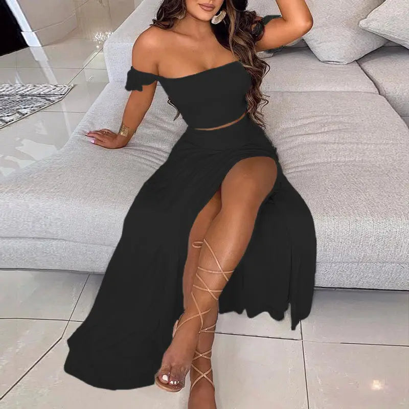 black off-the-shoulder two-piece maxi dress with high slit and ruffled sleeves in lightweight bohemian fabric for elegant occasions