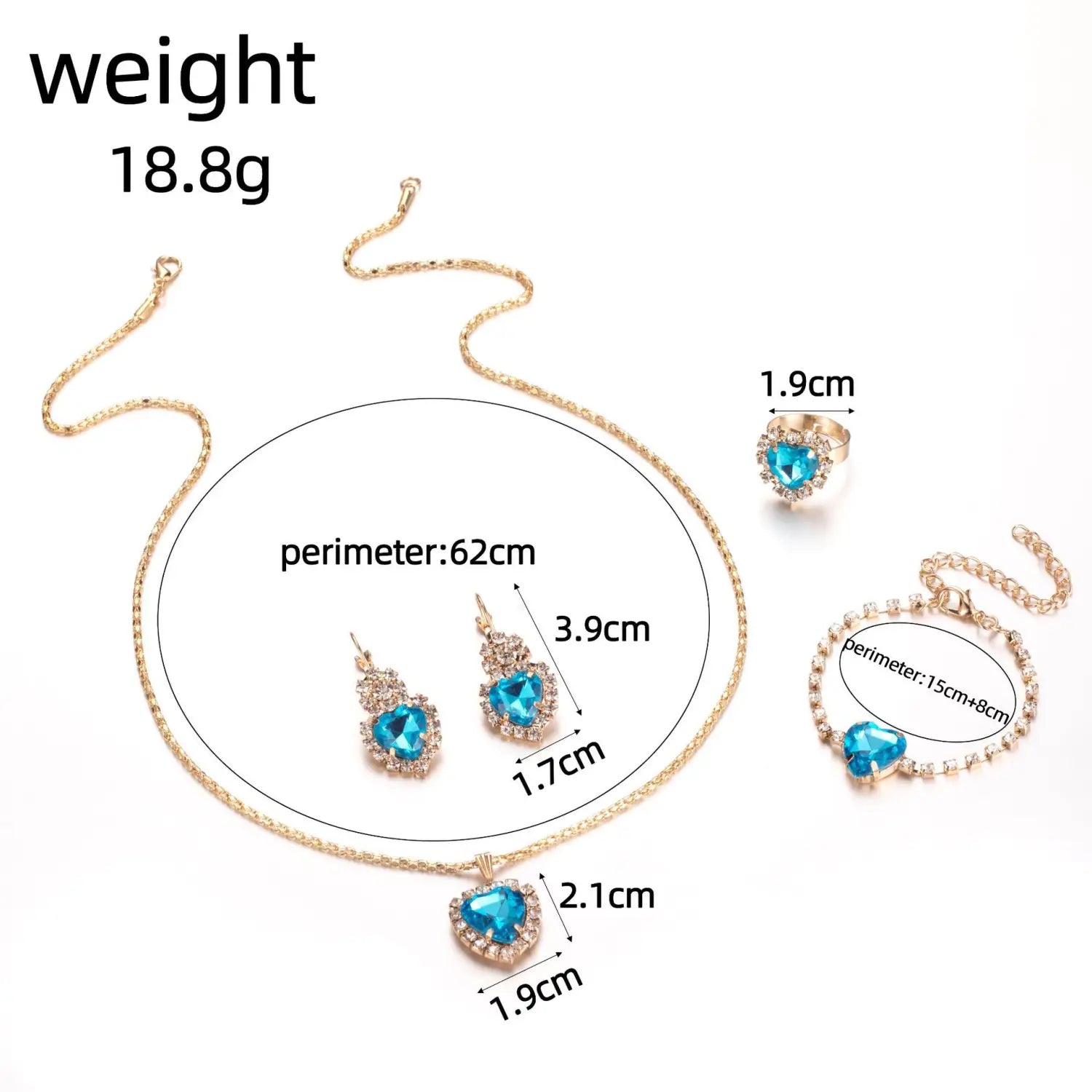 Gold-toned 4 piece heart rhinestone jewelry set featuring blue heart-shaped gemstone pendants and matching earrings, ring, and bracelet adorned with sparkling crystals.