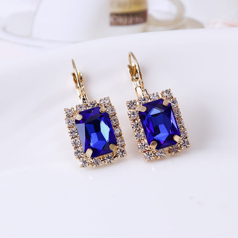 Elegant royal blue rectangular crystal earrings with a gold-tone frame and clear rhinestones from the elegant rectangular gemstone gold jewelry three piece set.