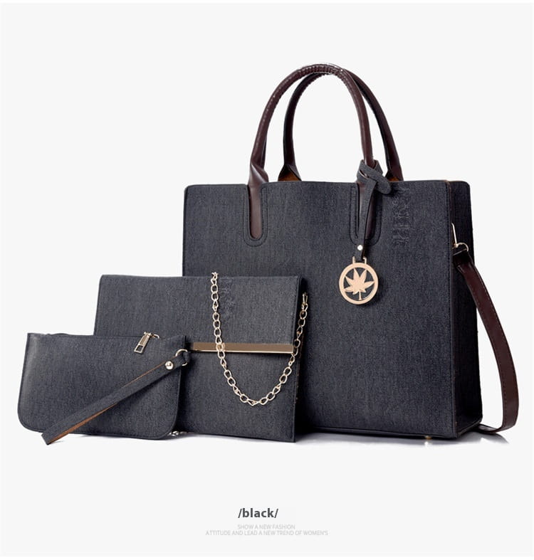 black textured handbag set with brown leather handles and gold maple leaf charm from denim and leather three piece multi compartment handbag set