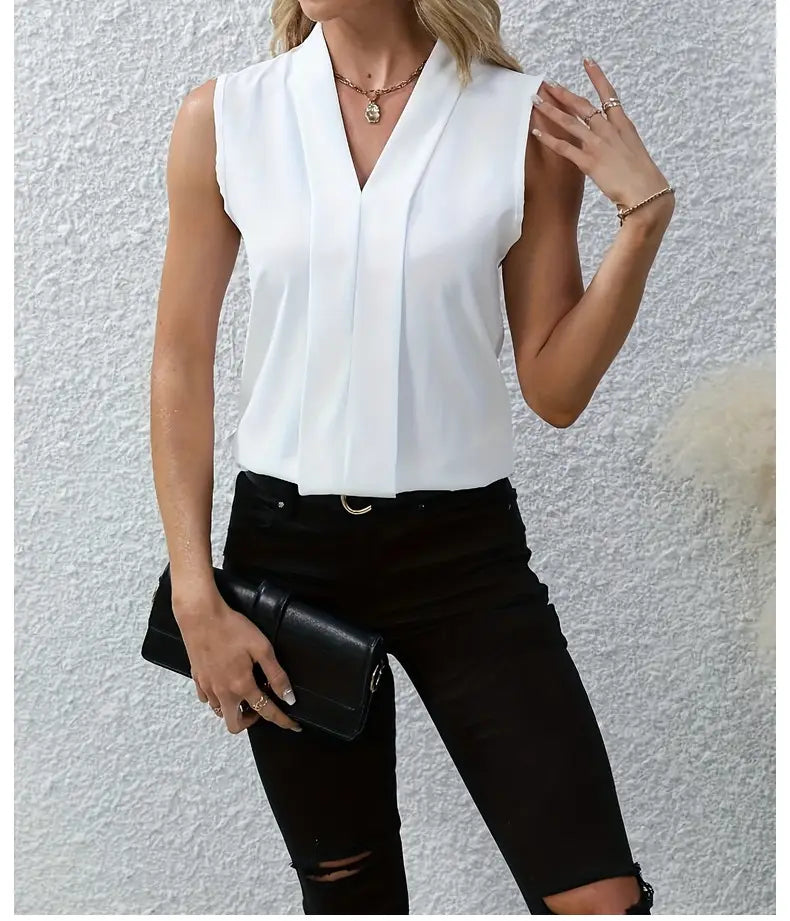 White sleeveless chiffon blouse for women featuring a v-neck and pleated front detail.