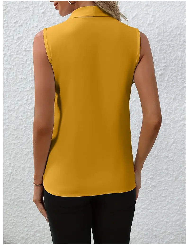 A sleeveless mustard yellow chiffon blouse with a v neck collar and smooth flowing fabric for women.