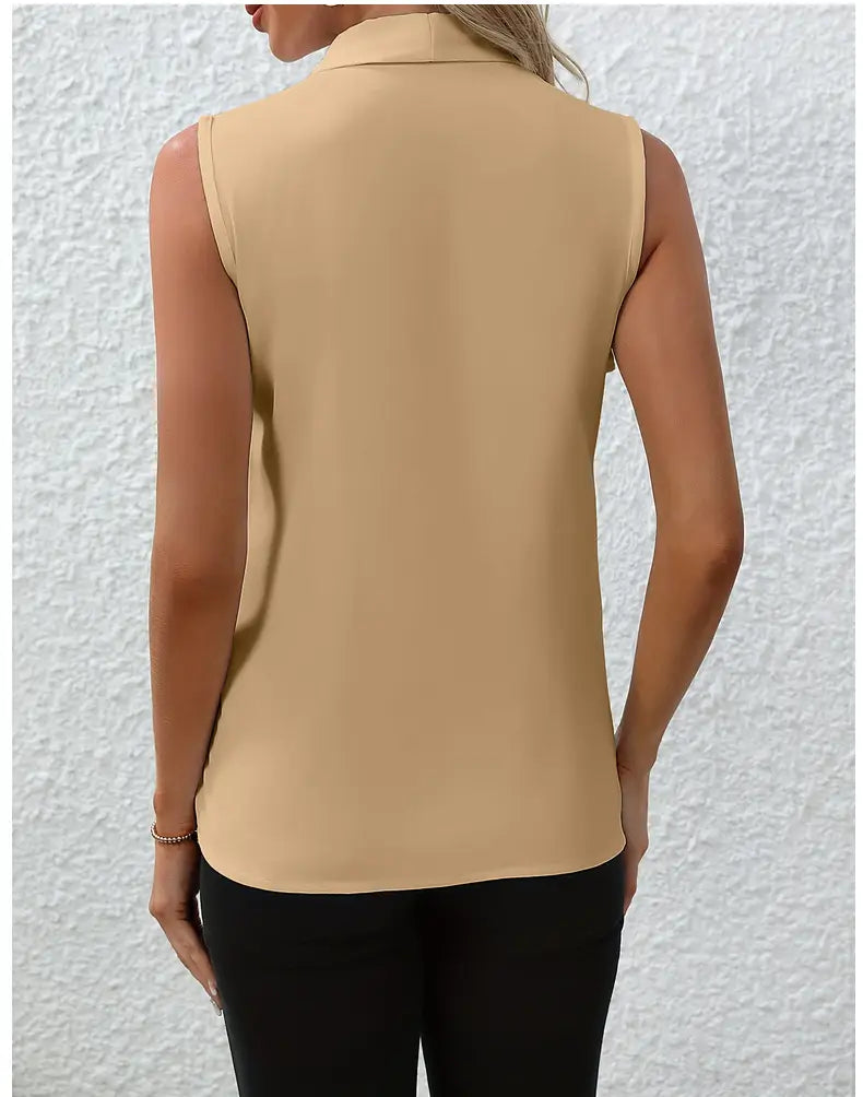 beige sleeveless chiffon blouse with a v-neck collar and smooth flowing fabric designed for women