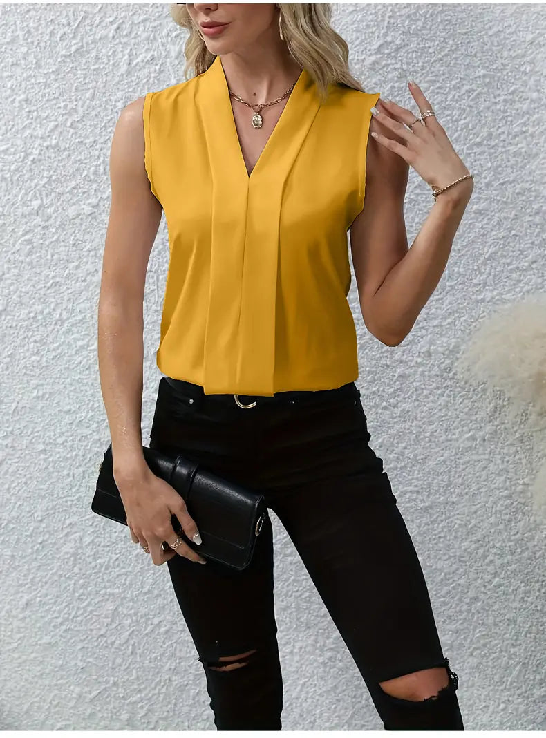 A vibrant yellow sleeveless chiffon blouse for women featuring a v-neck and front pleats.