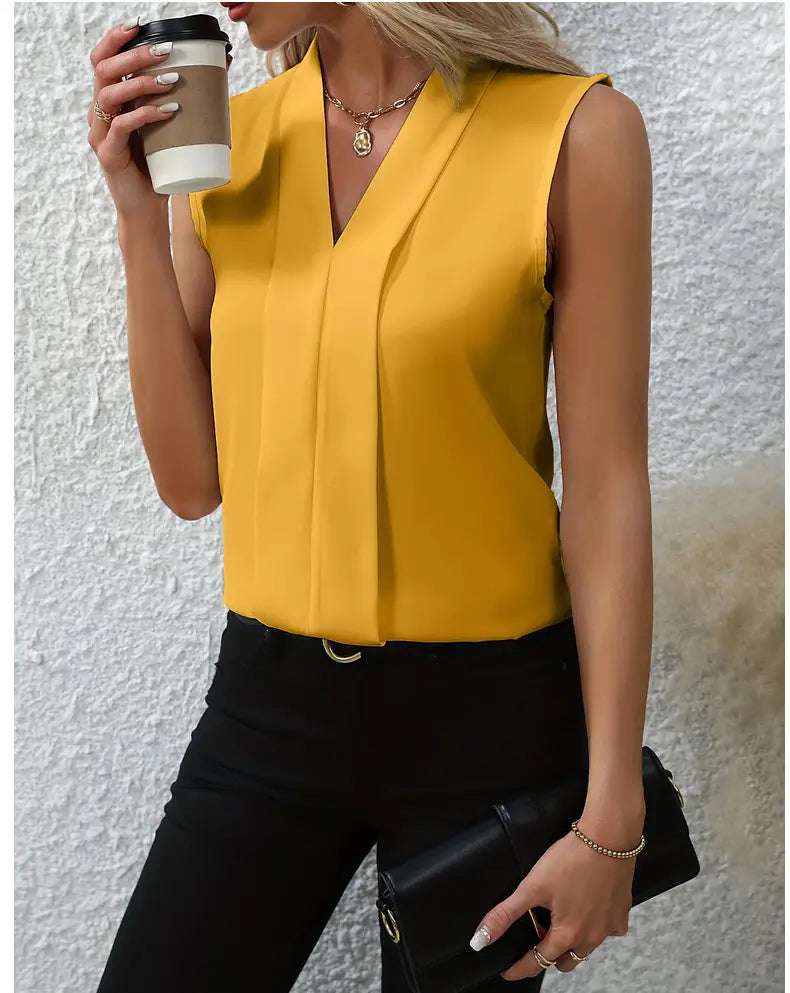 Bright yellow chiffon sleeveless blouse for women featuring a v-neck and front pleats.
