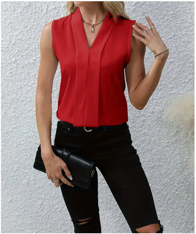 Red sleeveless chiffon blouse for women featuring a v-neck and pleated front design.