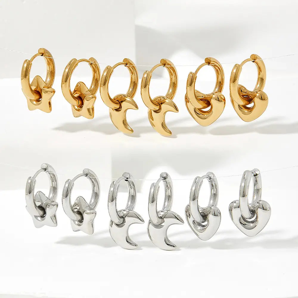 Polished stainless steel gold and silver hoop earrings with minimalist star crescent moon and heart geometric charms.
