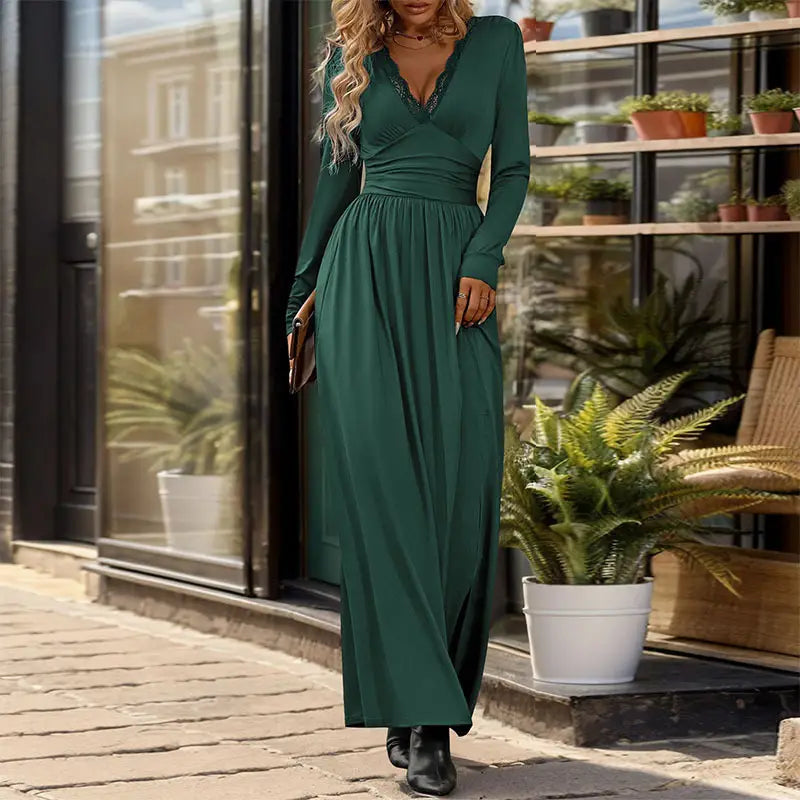 v neck long sleeve ruched slit maxi dress in deep emerald green with a v-neckline and subtle ruching at the waist