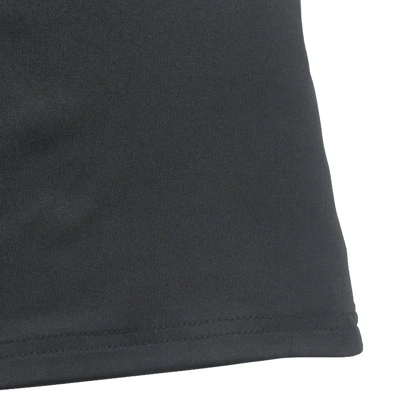 Black textured fabric with subtle woven pattern and neatly stitched hem of v neck long sleeve ruched slit maxi dress.