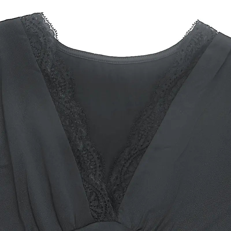 Black satin v neck long sleeve ruched slit maxi dress with delicate lace trim along the neckline.