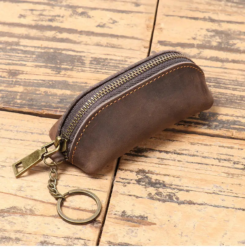 Brown leather premium cowhide multi-functional key and coin pouch with brass zipper and matching metal ring.