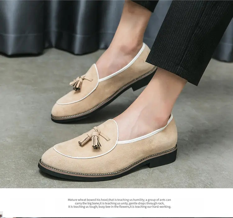 Beige suede men’s tassel loafers with white piping made of matte cowhide shoes.