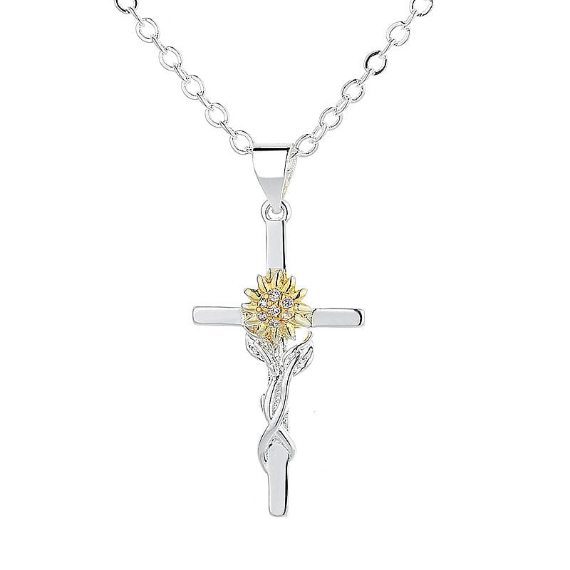 Two-tone silver and gold sunflower cross pendant necklace featuring a silver cross with a gold sunflower center set with clear stones and delicate silver vine accents.