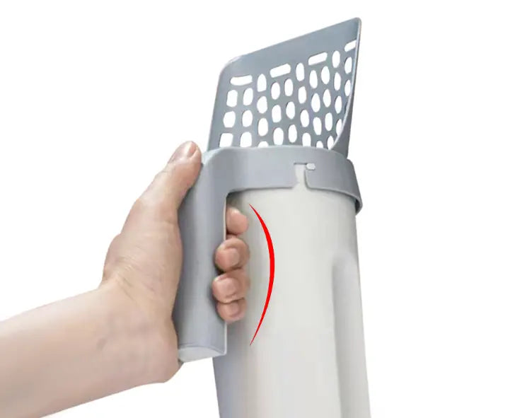 Gray plastic cat litter scoop with a perforated head and ergonomic handle featuring an integrated bag dispenser for convenient waste removal.