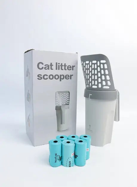Gray plastic cat litter scoop with perforated handle and integrated waste container for convenient cleaning and disposal.