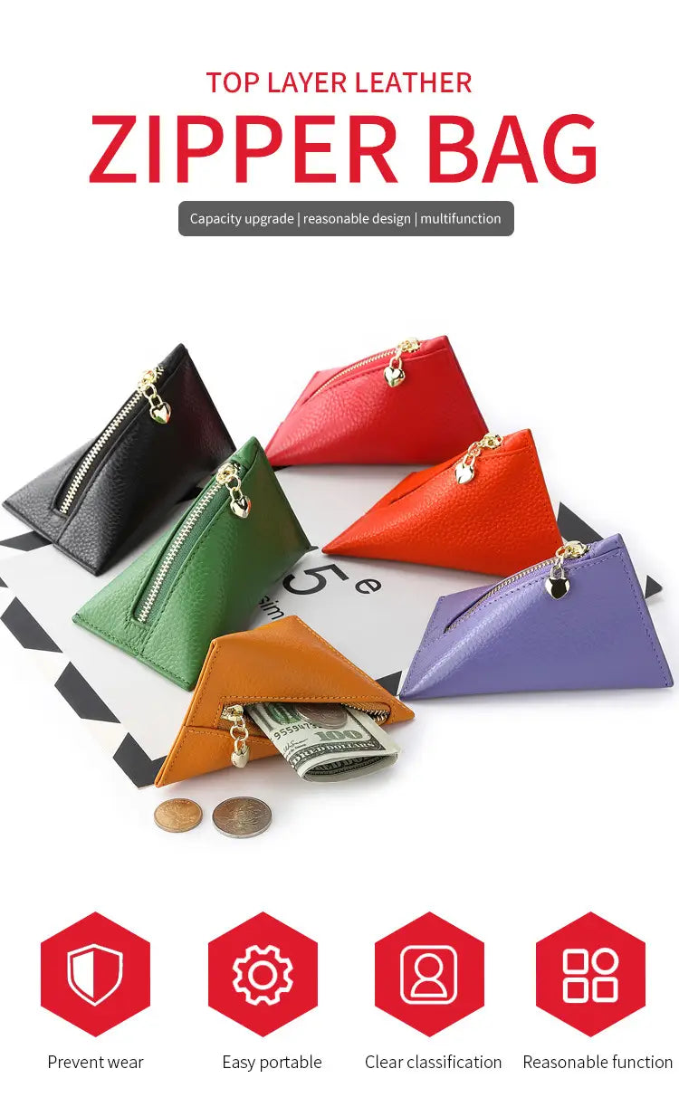 A genuine leather heart charm mini coin purse featuring a triangular-shaped zipper bag made of top layer leather in vibrant black red green orange and purple colors.