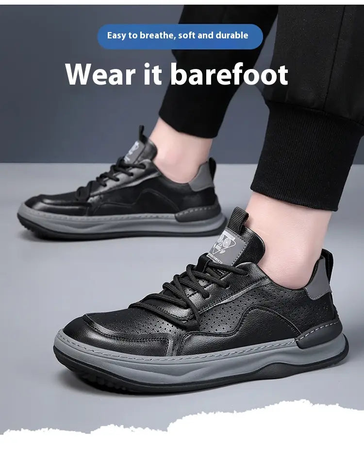 Men’s leather perforated breathable sneakers in black and gray with perforated leather uppers, padded collar for comfort, and cushioned sole designed for breathability.