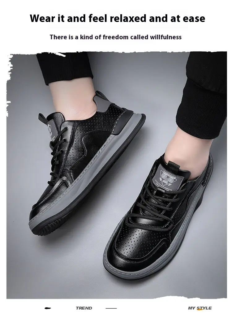 Men’s leather perforated breathable sneakers in black with a gray rubber sole and subtle branding on the tongue.