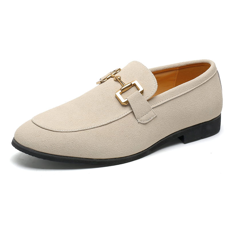 Beige suede buckle loafers for men featuring a gold-tone horsebit buckle and black rubber sole.