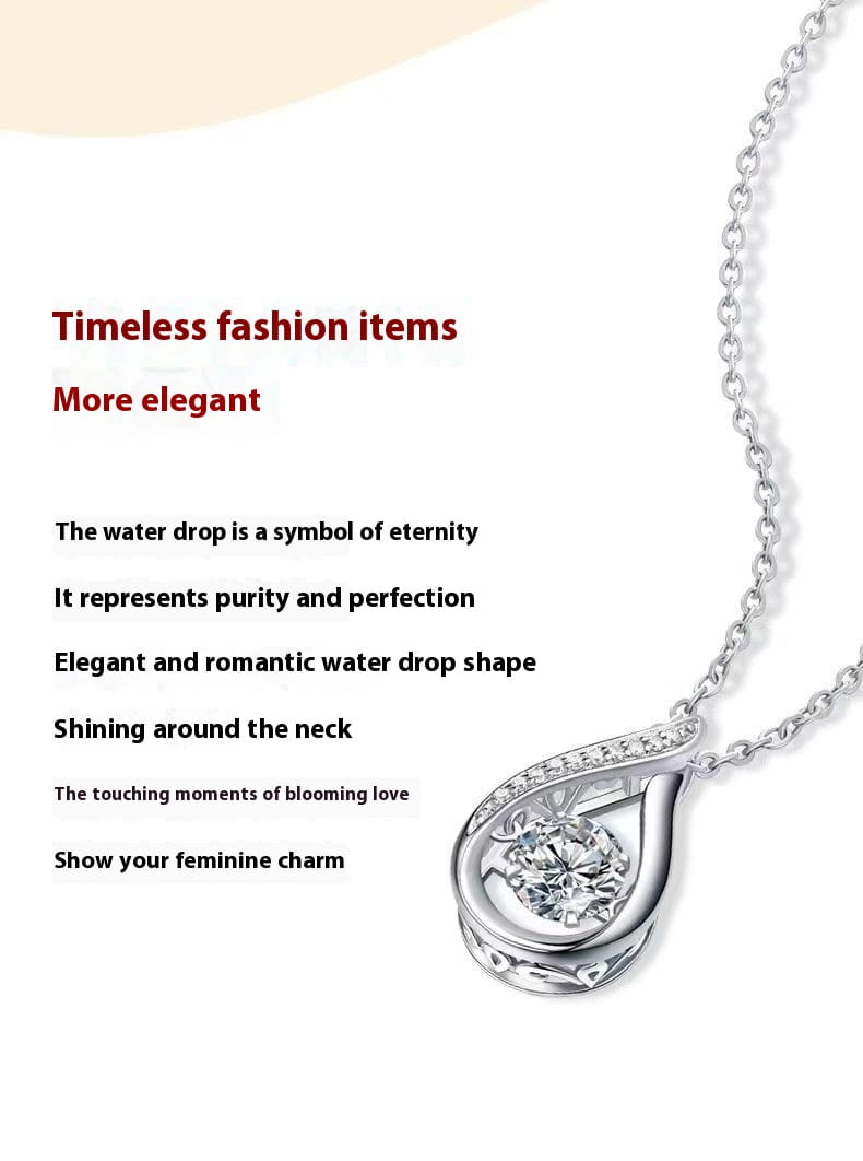 Elegant silver teardrop Moissanite pendant necklace in 925 sterling silver featuring a central sparkling diamond halo surrounded by smaller stones and delicate engraved detailing.
