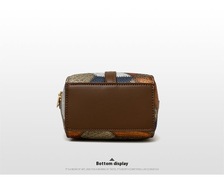 Two tone soft leather contrast stitch shoulder bag with patchwork geometric leather panels in earthy tones and gold hardware.