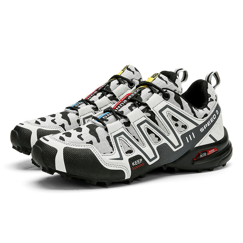 Men’s camouflage waterproof trail running and hiking shoes in white and black with bold geometric branding on the side.