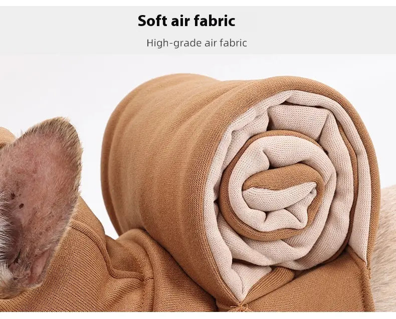 a rolled-up tan and cream two-toned soft air fabric snail dog costume with a plush high-grade texture designed as halloween pet apparel