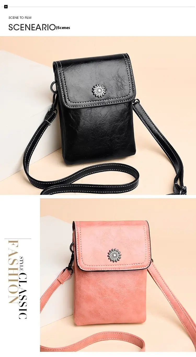 Schwarze und rosafarbene Umhängetaschen für das Telefon aus Kunstleder mit silbernen Sonnenstrahl-Knopfverschlüssen aus der Kollektion „Faux Leather Floral and Sunburst Crossbody Phone Bag“.