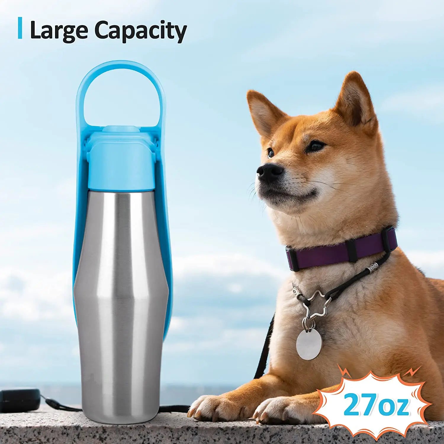 A sleek 27oz stainless steel pet water bottle with a bright blue handle and lid featuring a silicone bowl for convenient use.