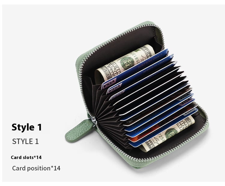 Light green leather RFID card wallet with 14 card slots and zipper closure for secure coin storage in sage green.