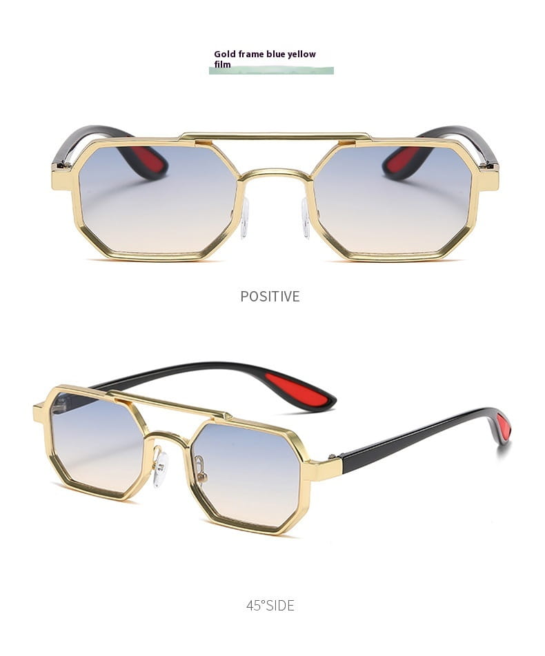 Gafas de sol tipo aviador con montura dorada, lentes octogonales y varillas negras con puntas rojas acentuadas; con diseño steampunk metálico y protección UV400.
