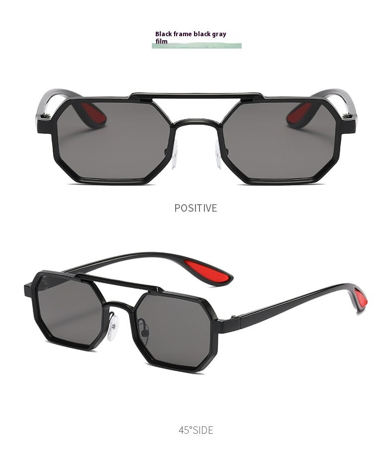Gafas de sol steampunk de metal octogonales negras con lentes grises UV400 y acentos en las puntas de las sienes rojas.