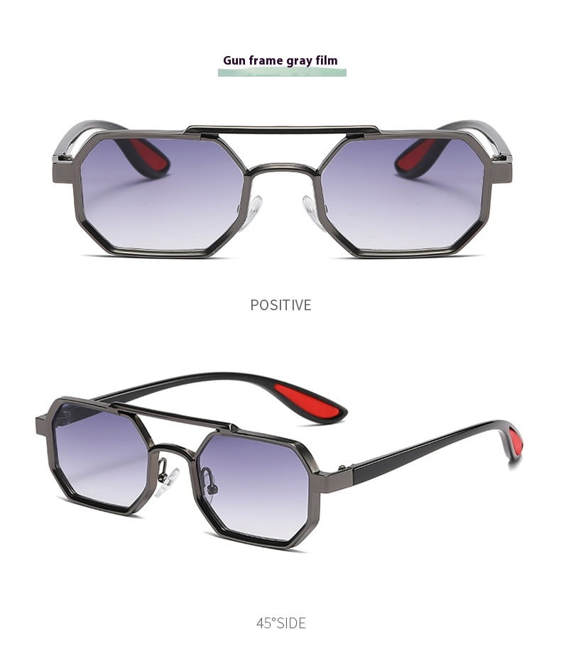 Gafas de sol steampunk octogonales UV400 para moda con construcción de metal negro en la montura, lentes octogonales con degradado gris y puntas interiores de las sienes rojas.