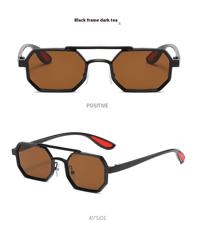 Gafas de sol steampunk octogonales con montura negra, lentes UV400 de color té oscuro y acentos rojos en las sienes, diseñadas para uso en moda.