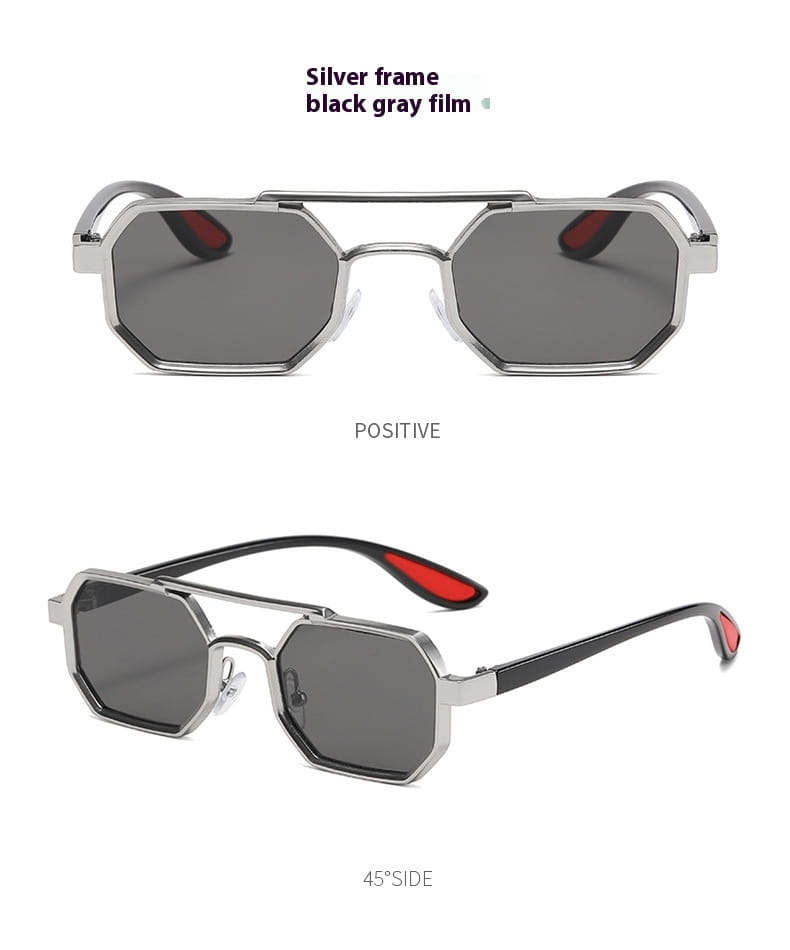 Gafas de sol steampunk octogonales con montura plateada, lentes UV400 negro-gris y acentos rojos en las puntas de las sienes.