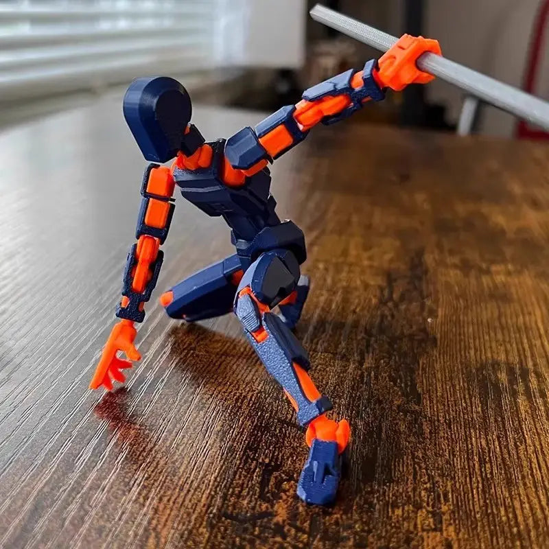 洗練されたモジュール式デザインの、青色およびオレンジ色の3Dプリント関節可動ロボットアクションフィギュア用ダミー 2.0。