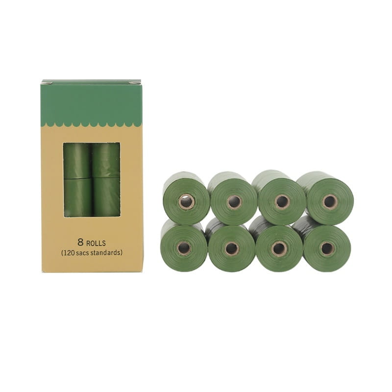 eight rolls of olive green biodegradable dog waste bags made of eco friendly plastic in a cardboard box for pet garbage disposal