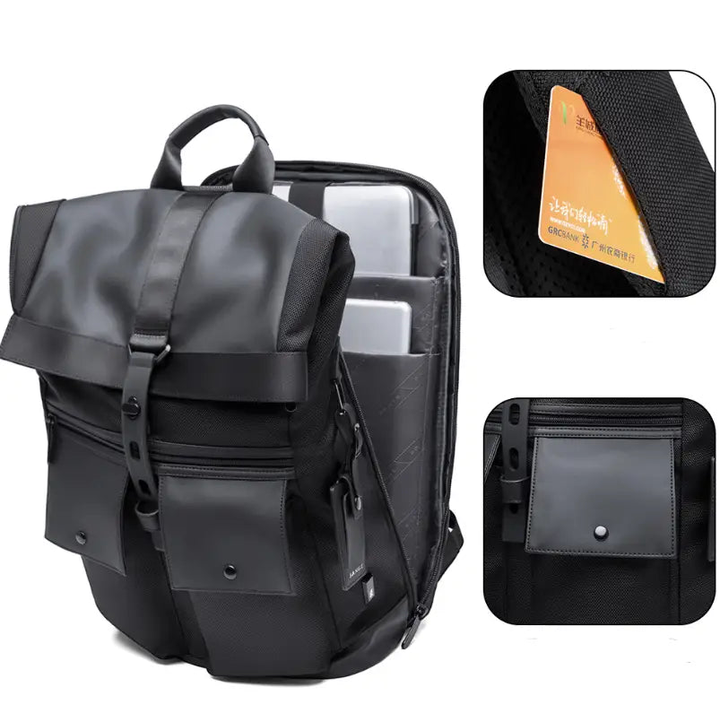 Black nylon and leather hybrid men’s 16 inch roll top laptop backpack with multiple zippered compartments and a front pocket featuring a snap button closure.